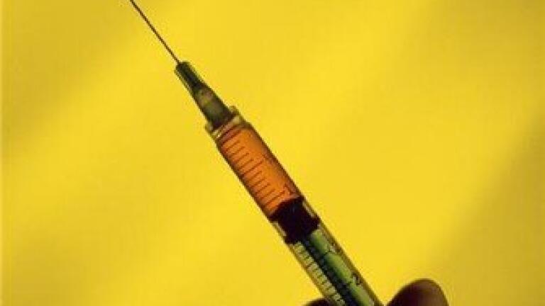Heart attacks 'could be halved by flu injection'